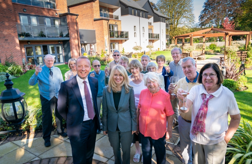 Esther and residents toast second birthday