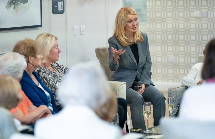 Esther hosts a discussion with residents