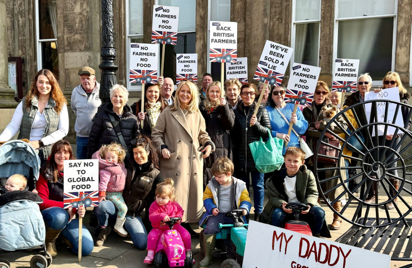 Esther with farmers and their families at a protest rally