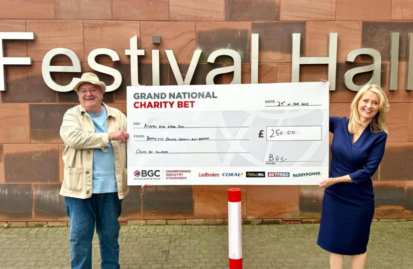 Esther presents cheque