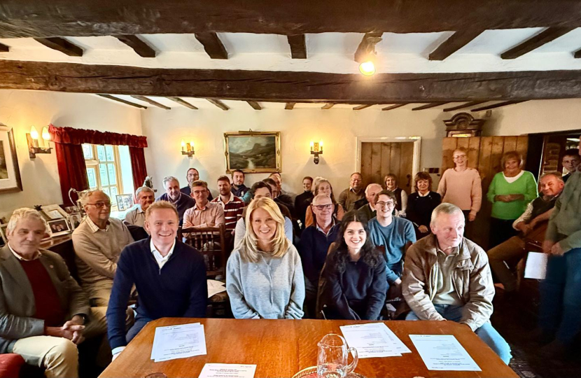 Esther and Robbie with farmers