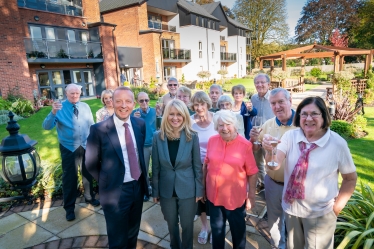 Esther and residents toast second birthday