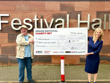 Esther presents cheque