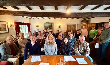 Esther and Robbie with farmers