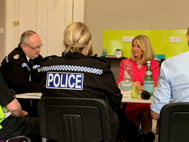 Esther with police officers